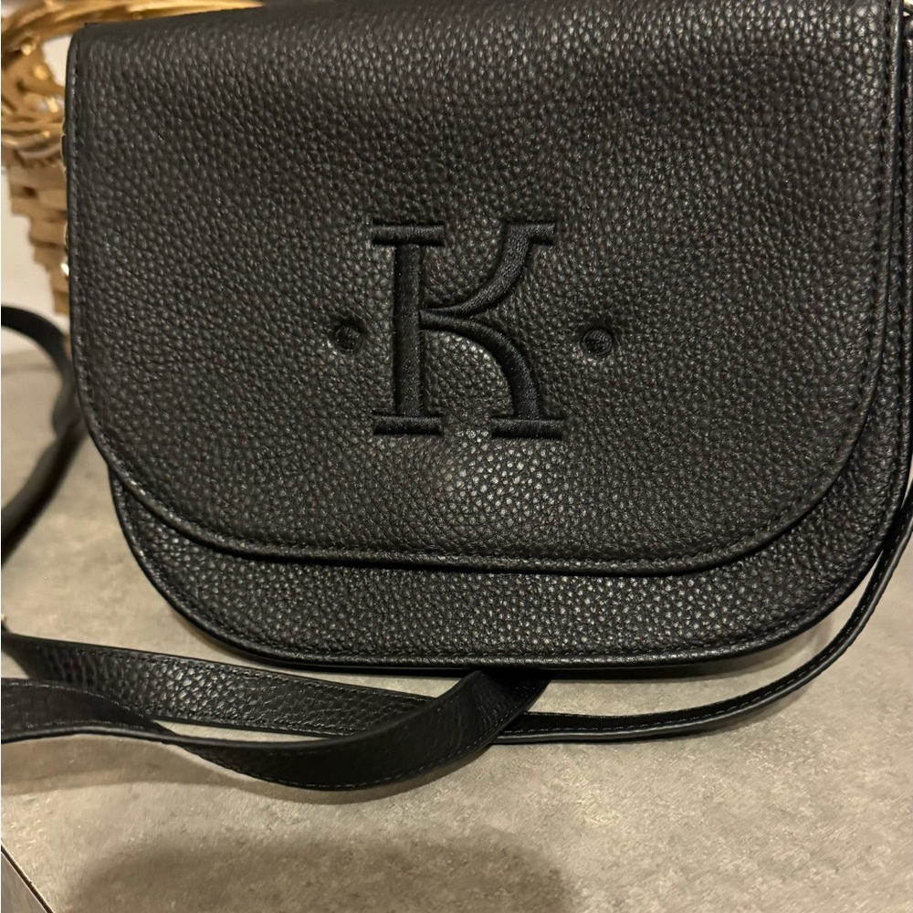 Thirty-one Convertible Belt B with the “K” initial on the front